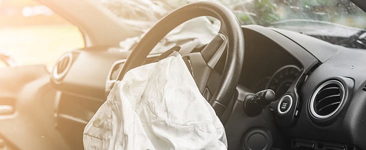 Opened air bag at a car accident